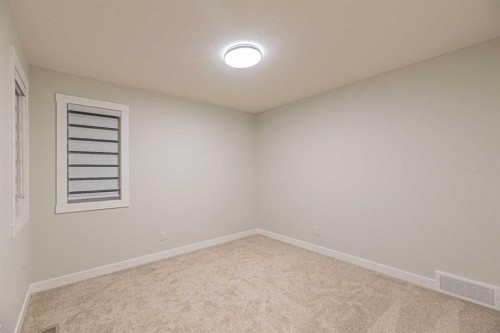 65 Amblefield View Nw, Calgary, AB - Indoor Photo Showing Other Room