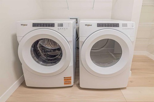 65 Amblefield View Nw, Calgary, AB - Indoor Photo Showing Laundry Room