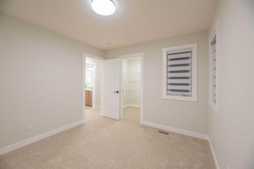 65 Amblefield View Nw, Calgary, AB - Indoor Photo Showing Other Room