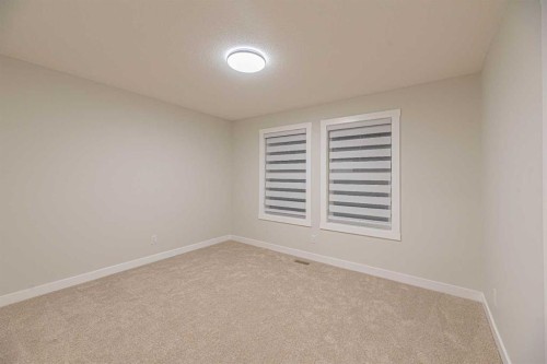 65 Amblefield View Nw, Calgary, AB - Indoor Photo Showing Other Room