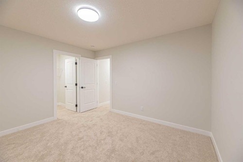 65 Amblefield View Nw, Calgary, AB - Indoor Photo Showing Other Room