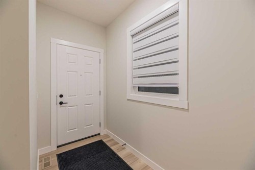 65 Amblefield View Nw, Calgary, AB - Indoor Photo Showing Other Room