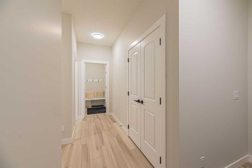 65 Amblefield View Nw, Calgary, AB - Indoor Photo Showing Other Room