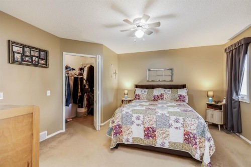 1808 Meadowbrook Gate Se, Airdrie, AB - Indoor Photo Showing Bedroom