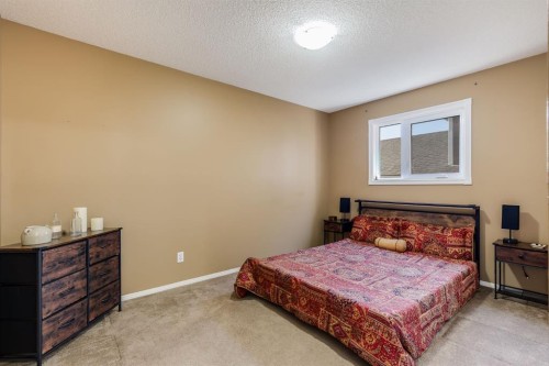 1808 Meadowbrook Gate Se, Airdrie, AB - Indoor Photo Showing Bedroom