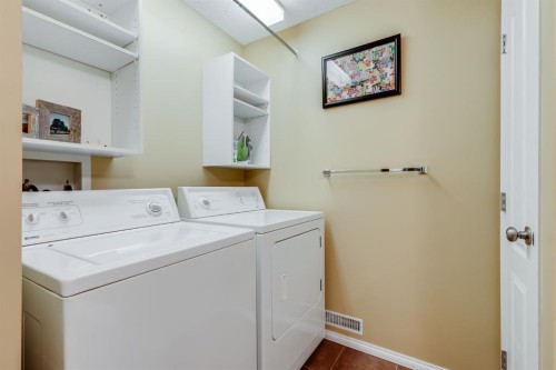 1808 Meadowbrook Gate Se, Airdrie, AB - Indoor Photo Showing Laundry Room