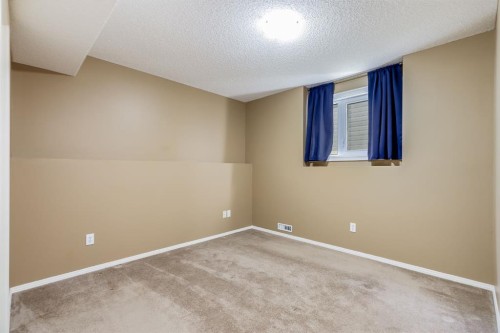 1808 Meadowbrook Gate Se, Airdrie, AB - Indoor Photo Showing Other Room