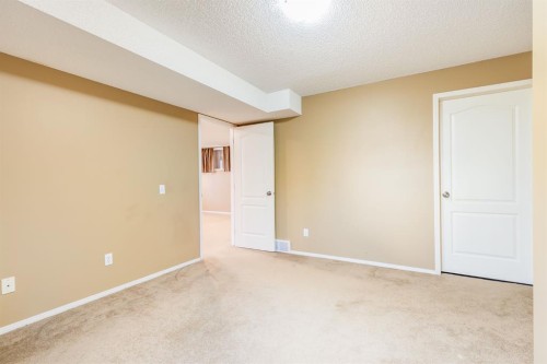 1808 Meadowbrook Gate Se, Airdrie, AB - Indoor Photo Showing Other Room