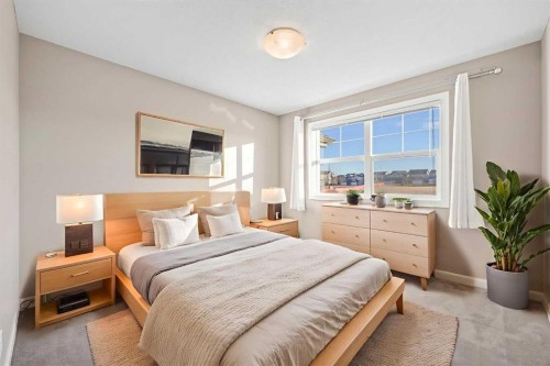 82 Panatella Road Nw, Calgary, AB - Indoor Photo Showing Bedroom