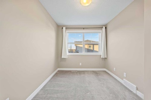 82 Panatella Road Nw, Calgary, AB - Indoor Photo Showing Other Room