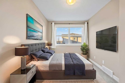 82 Panatella Road Nw, Calgary, AB - Indoor Photo Showing Bedroom