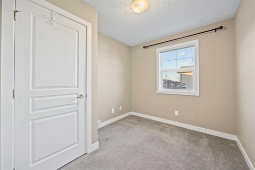 82 Panatella Road Nw, Calgary, AB - Indoor Photo Showing Other Room