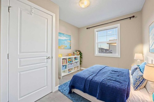 82 Panatella Road Nw, Calgary, AB - Indoor Photo Showing Bedroom
