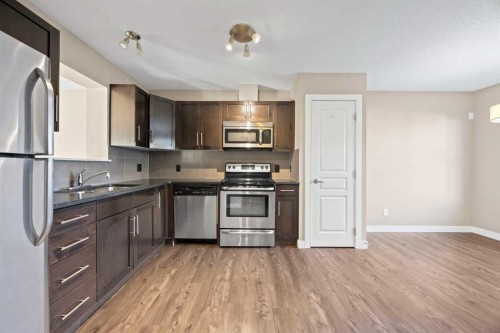 82 Panatella Road Nw, Calgary, AB - Indoor Photo Showing Kitchen With Stainless Steel Kitchen
