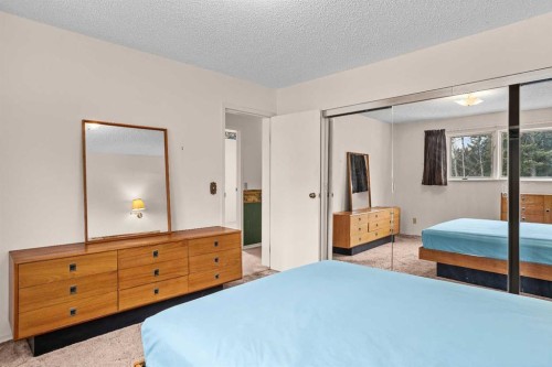 113 Larch Place, Canmore, AB - Indoor Photo Showing Bedroom