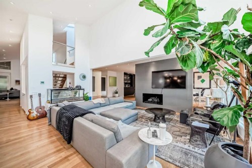 1128 Riverdale Avenue Sw, Calgary, AB - Indoor Photo Showing Living Room With Fireplace
