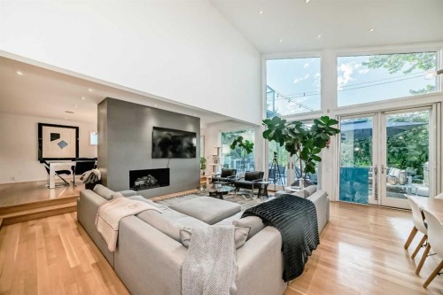 1128 Riverdale Avenue Sw, Calgary, AB - Indoor Photo Showing Living Room With Fireplace