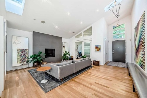 1128 Riverdale Avenue Sw, Calgary, AB - Indoor Photo Showing Other Room With Fireplace