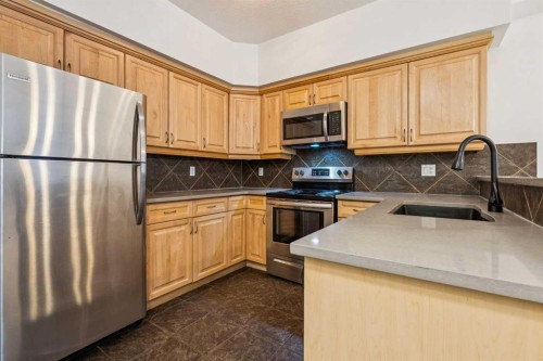 2107-1888 Signature Park Sw, Calgary, AB - Indoor Photo Showing Kitchen