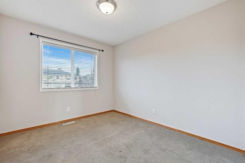 258 Rocky Ridge Court Nw, Calgary, AB - Indoor Photo Showing Other Room
