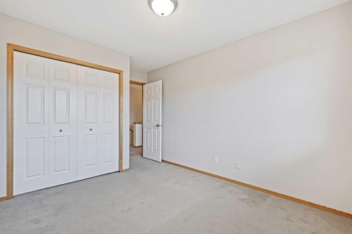 258 Rocky Ridge Court Nw, Calgary, AB - Indoor Photo Showing Other Room