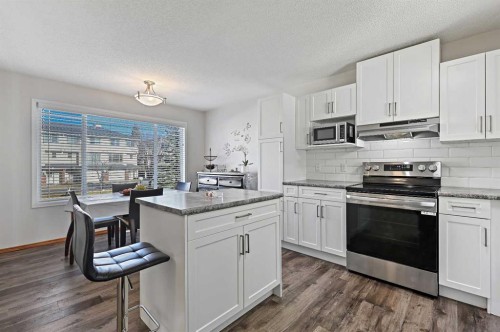 258 Rocky Ridge Court Nw, Calgary, AB - Indoor Photo Showing Kitchen