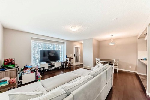 3140 Windsong Boulevard Sw, Airdrie, AB - Indoor Photo Showing Living Room