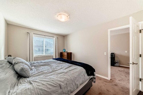 3140 Windsong Boulevard Sw, Airdrie, AB - Indoor Photo Showing Bedroom