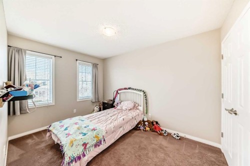 3140 Windsong Boulevard Sw, Airdrie, AB - Indoor Photo Showing Bedroom