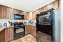 3140 Windsong Boulevard Sw, Airdrie, AB  - Indoor Photo Showing Kitchen 