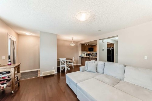3140 Windsong Boulevard Sw, Airdrie, AB - Indoor Photo Showing Living Room