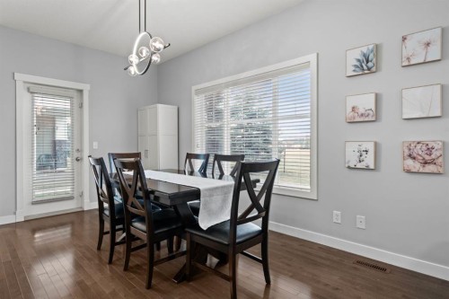 301-281 Cougar Ridge Drive Sw, Calgary, AB - Indoor Photo Showing Dining Room