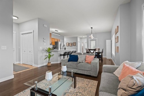 301-281 Cougar Ridge Drive Sw, Calgary, AB - Indoor Photo Showing Living Room