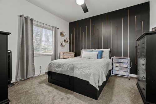 301-281 Cougar Ridge Drive Sw, Calgary, AB - Indoor Photo Showing Bedroom