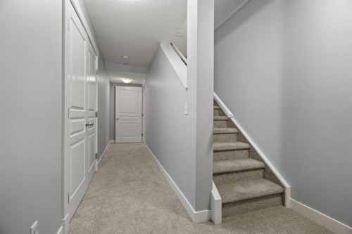 301-281 Cougar Ridge Drive Sw, Calgary, AB - Indoor Photo Showing Other Room