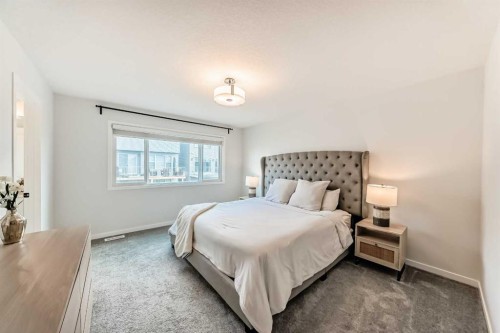 16 Lucas Passage Nw, Calgary, AB - Indoor Photo Showing Bedroom