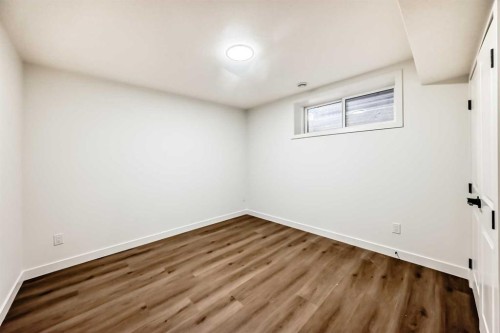 16 Lucas Passage Nw, Calgary, AB - Indoor Photo Showing Other Room