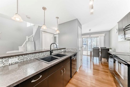136 Sage Valley Drive Nw, Calgary, AB - Indoor Photo Showing Kitchen With Double Sink