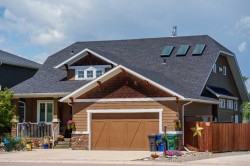 118 Riverwood Crescent SW Diamond Valley, AB T0L 0H0