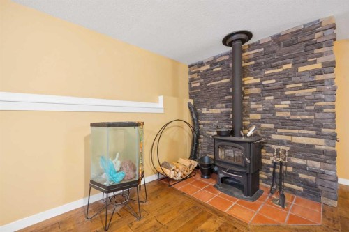 118 Riverwood Crescent Sw, Diamond Valley, AB - Indoor Photo Showing Other Room