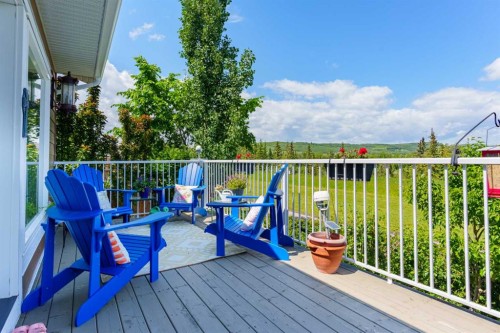 118 Riverwood Crescent Sw, Diamond Valley, AB - Outdoor With Deck Patio Veranda With Exterior