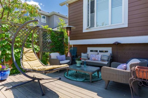 118 Riverwood Crescent Sw, Diamond Valley, AB - Outdoor With Deck Patio Veranda With Exterior