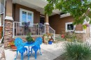 118 Riverwood Crescent Sw, Diamond Valley, AB  - Outdoor With Deck Patio Veranda 
