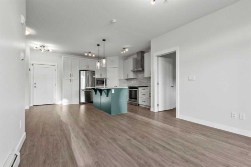 4205-522 Cranford Drive Se, Calgary, AB - Indoor Photo Showing Kitchen With Stainless Steel Kitchen With Upgraded Kitchen