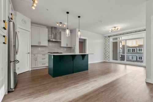 4205-522 Cranford Drive Se, Calgary, AB - Indoor Photo Showing Kitchen With Upgraded Kitchen