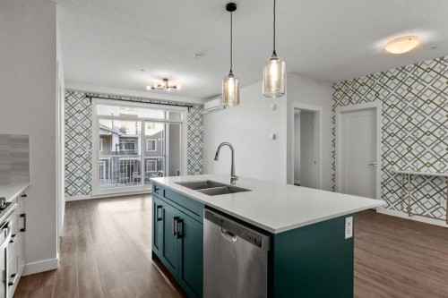 4205-522 Cranford Drive Se, Calgary, AB - Indoor Photo Showing Kitchen With Double Sink With Upgraded Kitchen