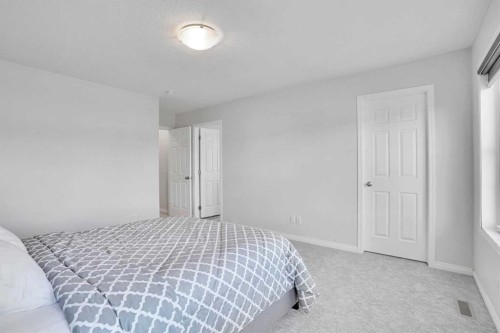 155 Savanna Way Ne, Calgary, AB - Indoor Photo Showing Bedroom
