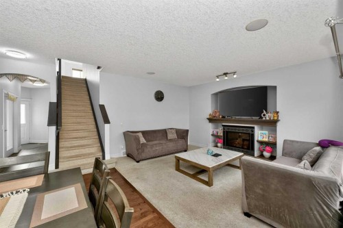 280 Willowmere Way, Chestermere, AB - Indoor Photo Showing Living Room With Fireplace