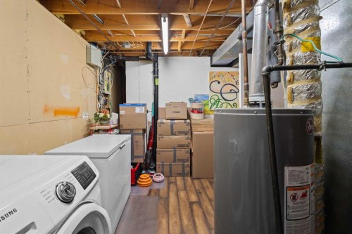 84 Fallswater Road Ne, Calgary, AB - Indoor Photo Showing Laundry Room