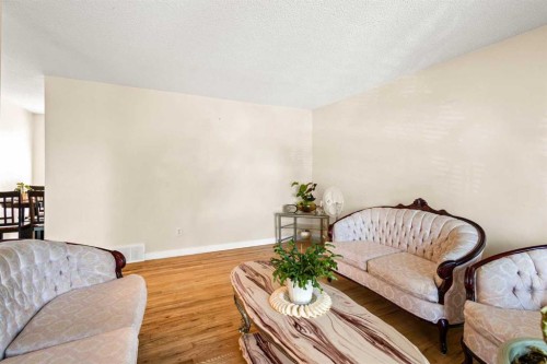 84 Fallswater Road Ne, Calgary, AB - Indoor Photo Showing Living Room